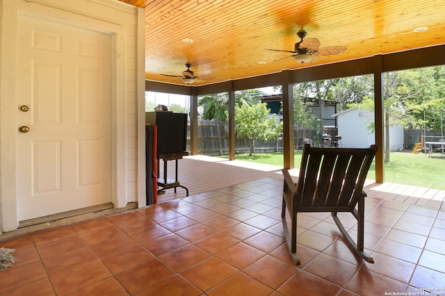 exterior space featuring wooden ceiling and ceiling fan