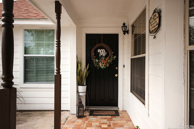 entrance to property with covered porch