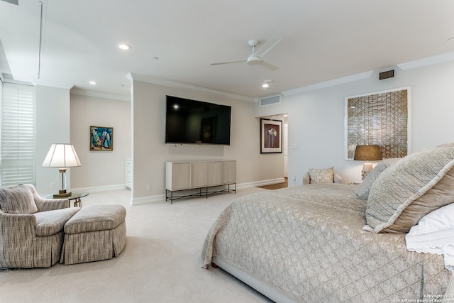 carpeted bedroom with crown molding and ceiling fan