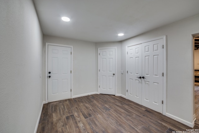 interior space with dark wood-type flooring