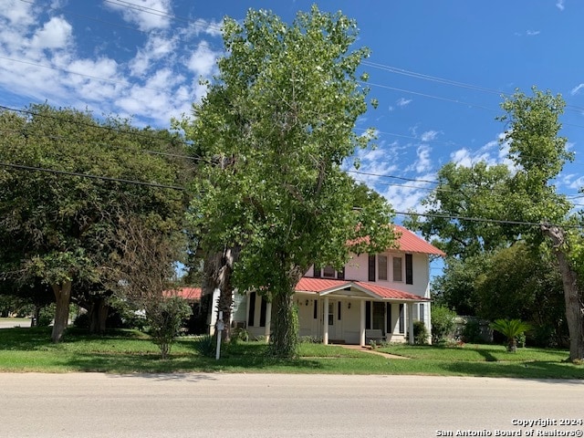 view of front of property with a front lawn