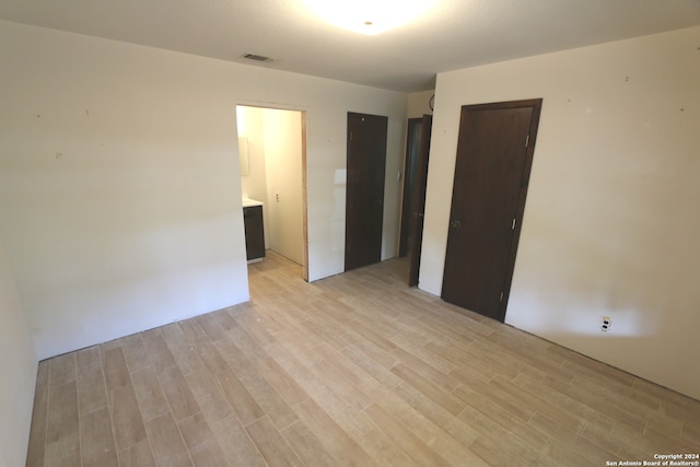 empty room featuring light wood-type flooring