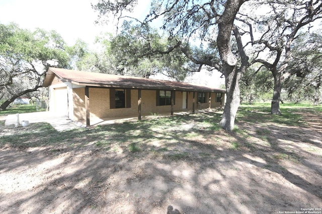 back of house featuring a patio area