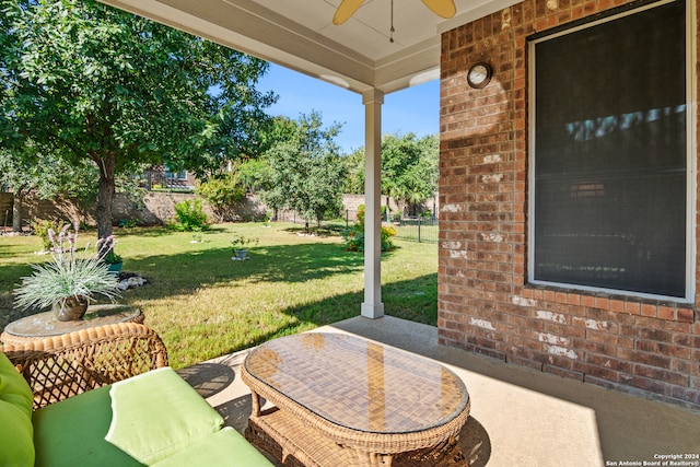 view of patio / terrace featuring ceiling fan