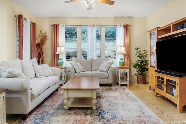 tiled living room featuring ceiling fan