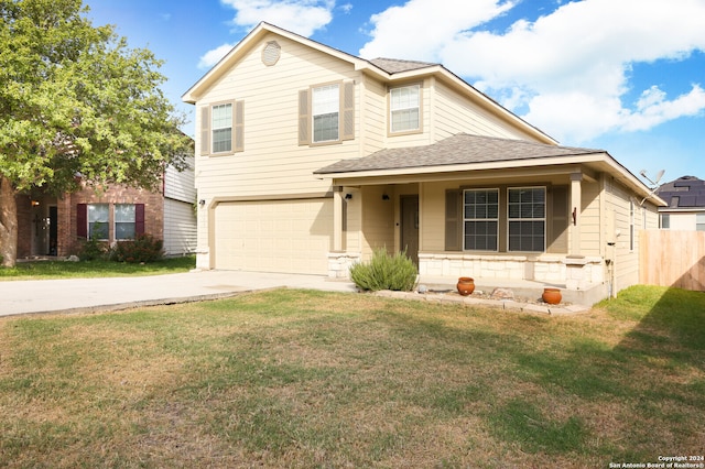 view of front facade featuring a garage and a front yard