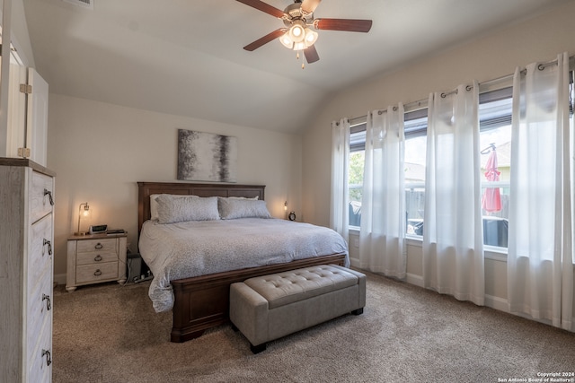 carpeted bedroom featuring lofted ceiling and ceiling fan