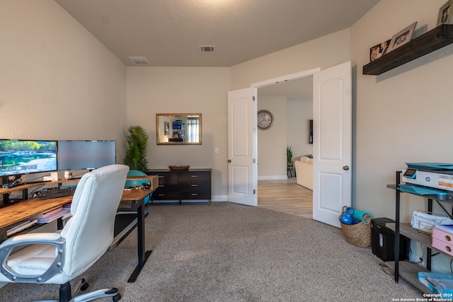 view of carpeted home office