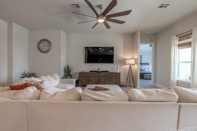 living room featuring ceiling fan