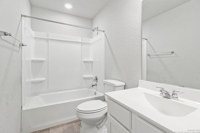 full bathroom with wood-type flooring, shower / bath combination, vanity, and toilet