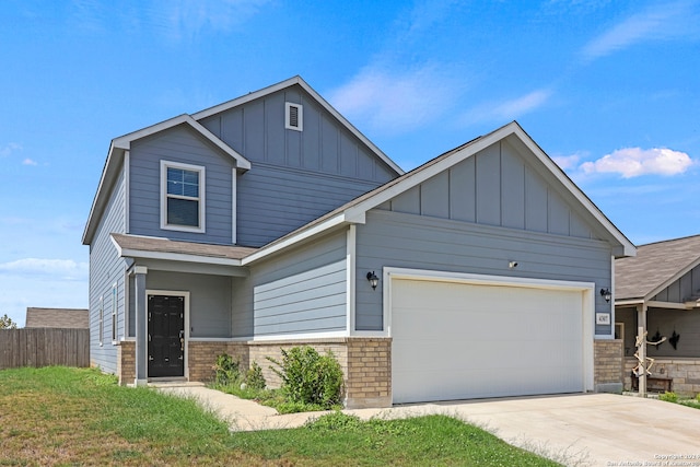 craftsman inspired home with a garage