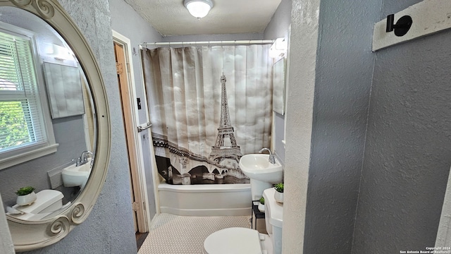 bathroom with shower / tub combo with curtain, tile patterned flooring, a textured ceiling, and toilet