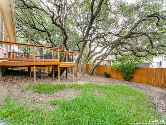 view of yard with a deck