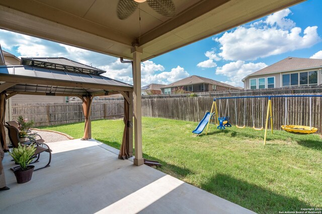 view of yard featuring a gazebo and a patio area