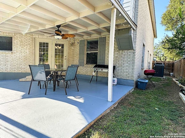 view of patio featuring ceiling fan, central AC unit, and a grill