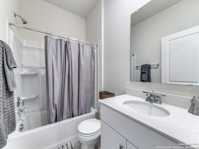 full bathroom with vanity, toilet, and shower / tub combo with curtain