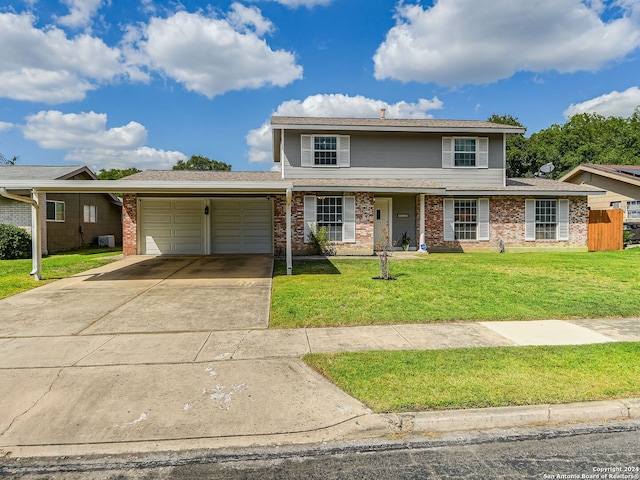 front of property with a garage and a front lawn