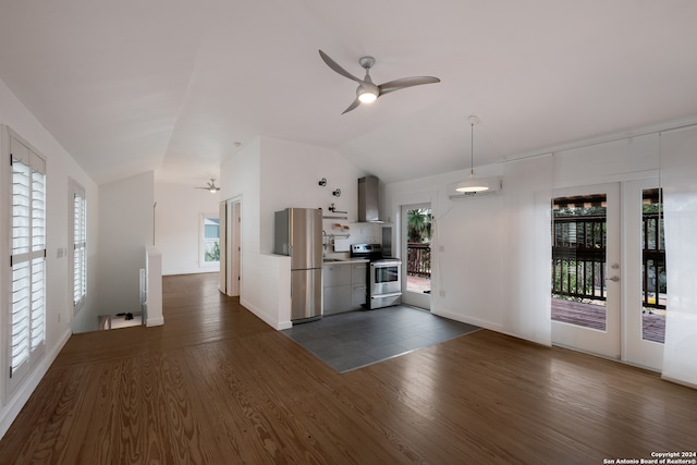 kitchen with ceiling fan, appliances with stainless steel finishes, dark wood-type flooring, and a healthy amount of sunlight