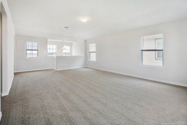 empty room with carpet flooring