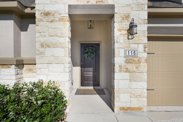 property entrance featuring a garage