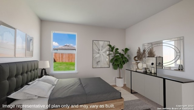 bedroom with light hardwood / wood-style floors