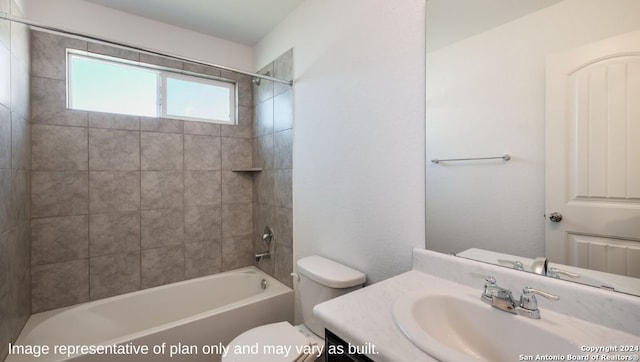 full bathroom with tiled shower / bath combo, toilet, and vanity