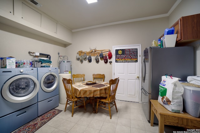 laundry area featuring water heater, independent washer and dryer, light tile patterned floors, and crown molding