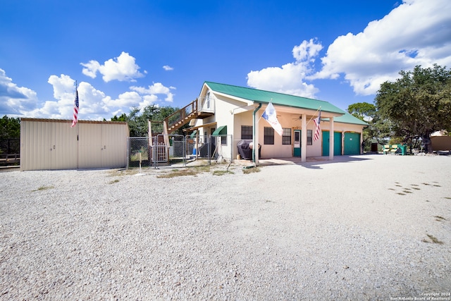 exterior space featuring an outdoor structure and a garage