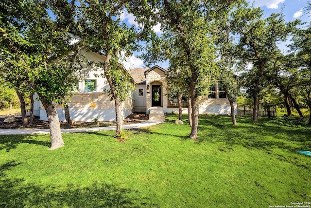 view of front of home with a front lawn