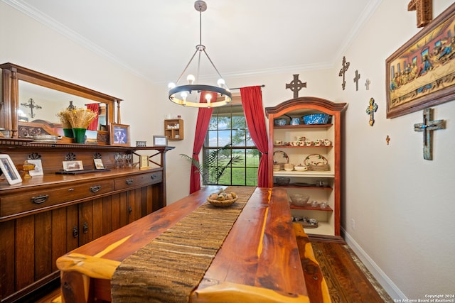 dining area with an inviting chandelier, crown molding, and dark hardwood / wood-style floors