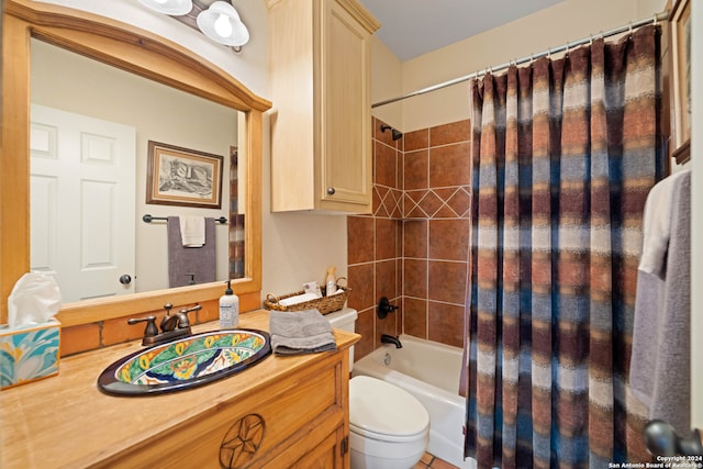 full bathroom with vanity, toilet, and shower / tub combo with curtain