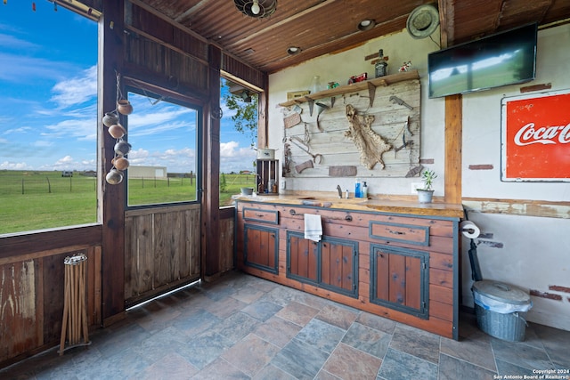 exterior space featuring wood ceiling and butcher block countertops