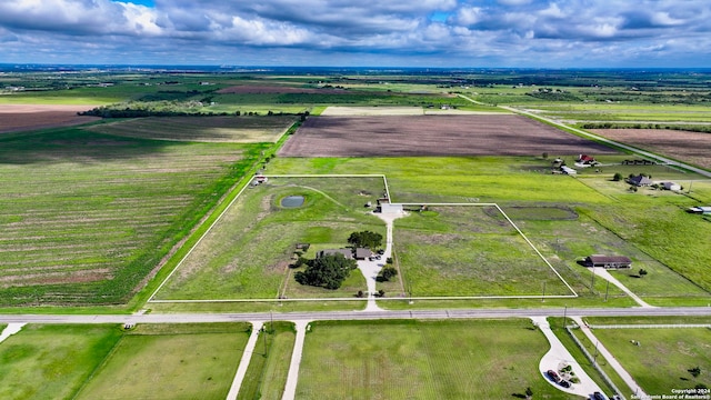 birds eye view of property featuring a rural view