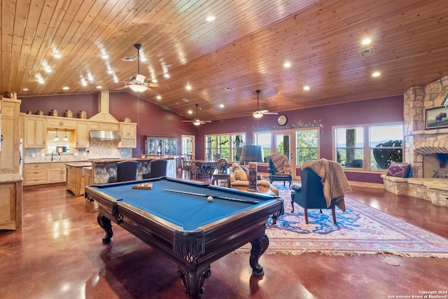 rec room featuring high vaulted ceiling, ceiling fan, wooden ceiling, and a fireplace