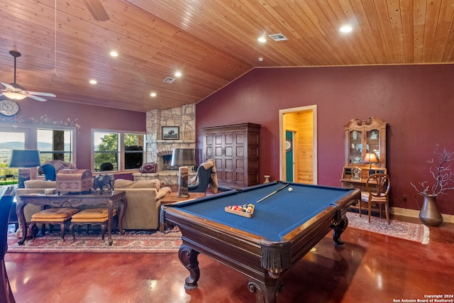 rec room featuring billiards, a stone fireplace, concrete floors, ceiling fan, and wooden ceiling