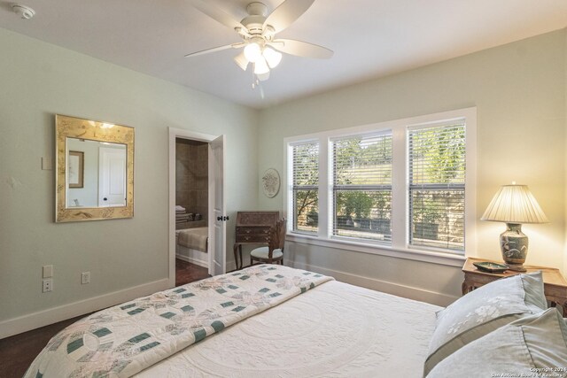 bedroom with connected bathroom and ceiling fan