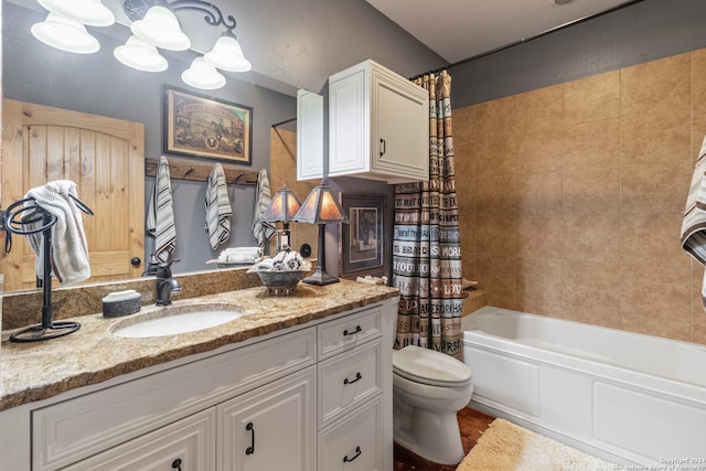 full bathroom featuring shower / tub combo, vanity, and toilet