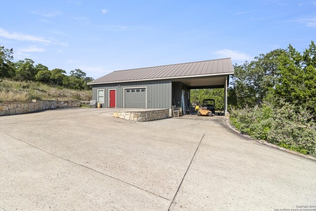 exterior space featuring a carport