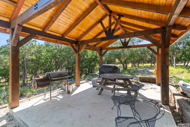 view of patio with grilling area and a gazebo