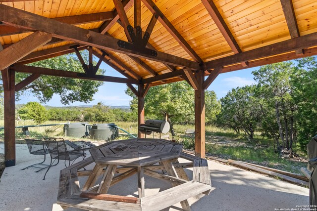 view of patio / terrace with grilling area and a gazebo