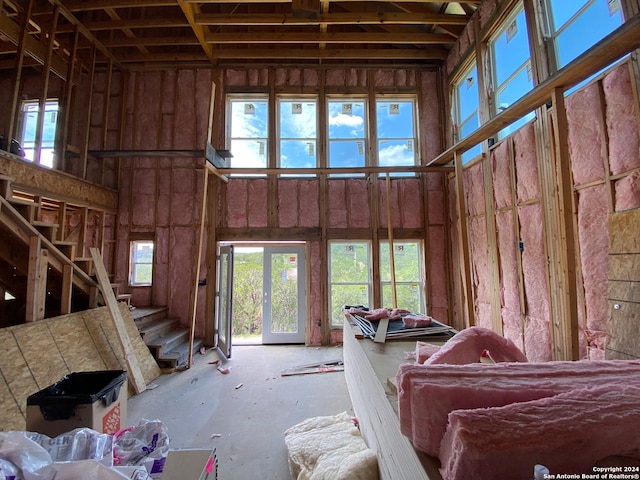 miscellaneous room featuring a high ceiling