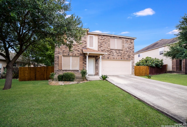 front of property with a front lawn and a garage