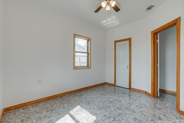 unfurnished bedroom featuring ceiling fan