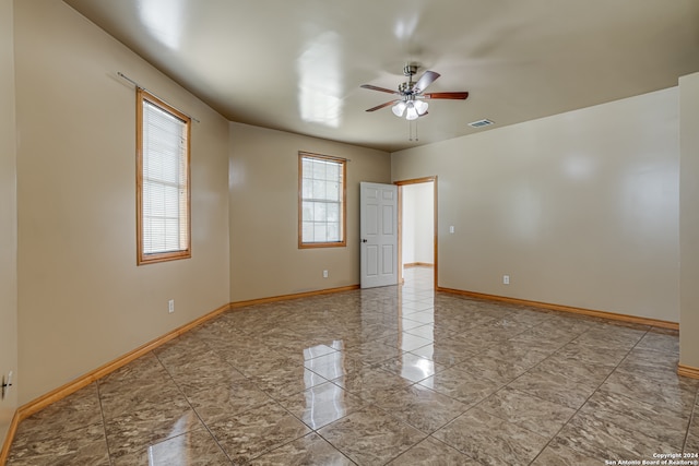 spare room featuring ceiling fan