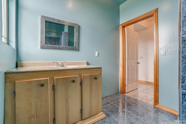 bathroom featuring vanity and tile patterned floors