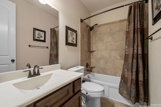 full bathroom featuring shower / bath combination with curtain, vanity, toilet, and tile patterned floors