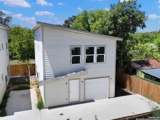 view of front of home with a garage