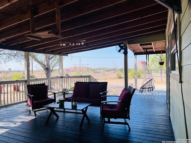 deck featuring an outdoor living space