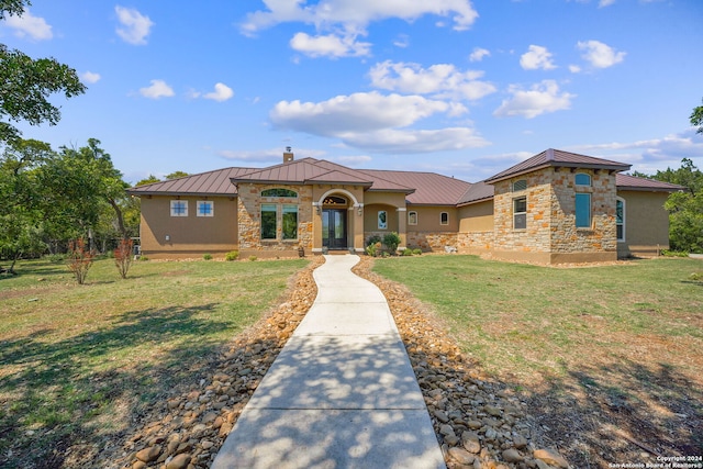 view of front of home featuring a front lawn