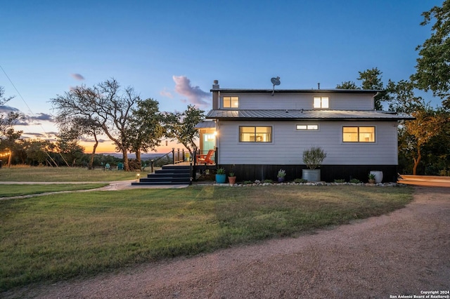 exterior space with a lawn